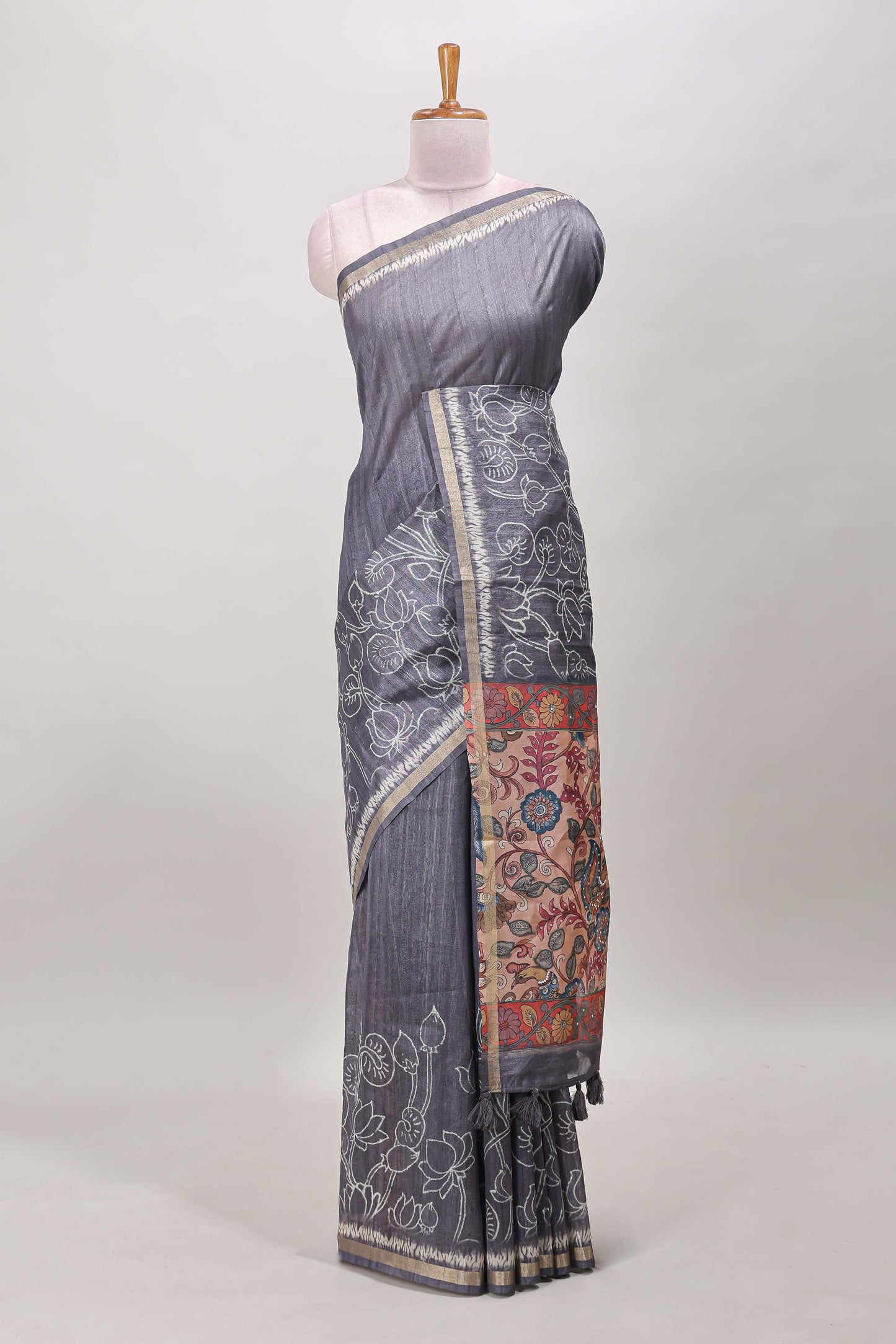 Grey floral design art tussar saree with self zari border and contrast floral print pallu