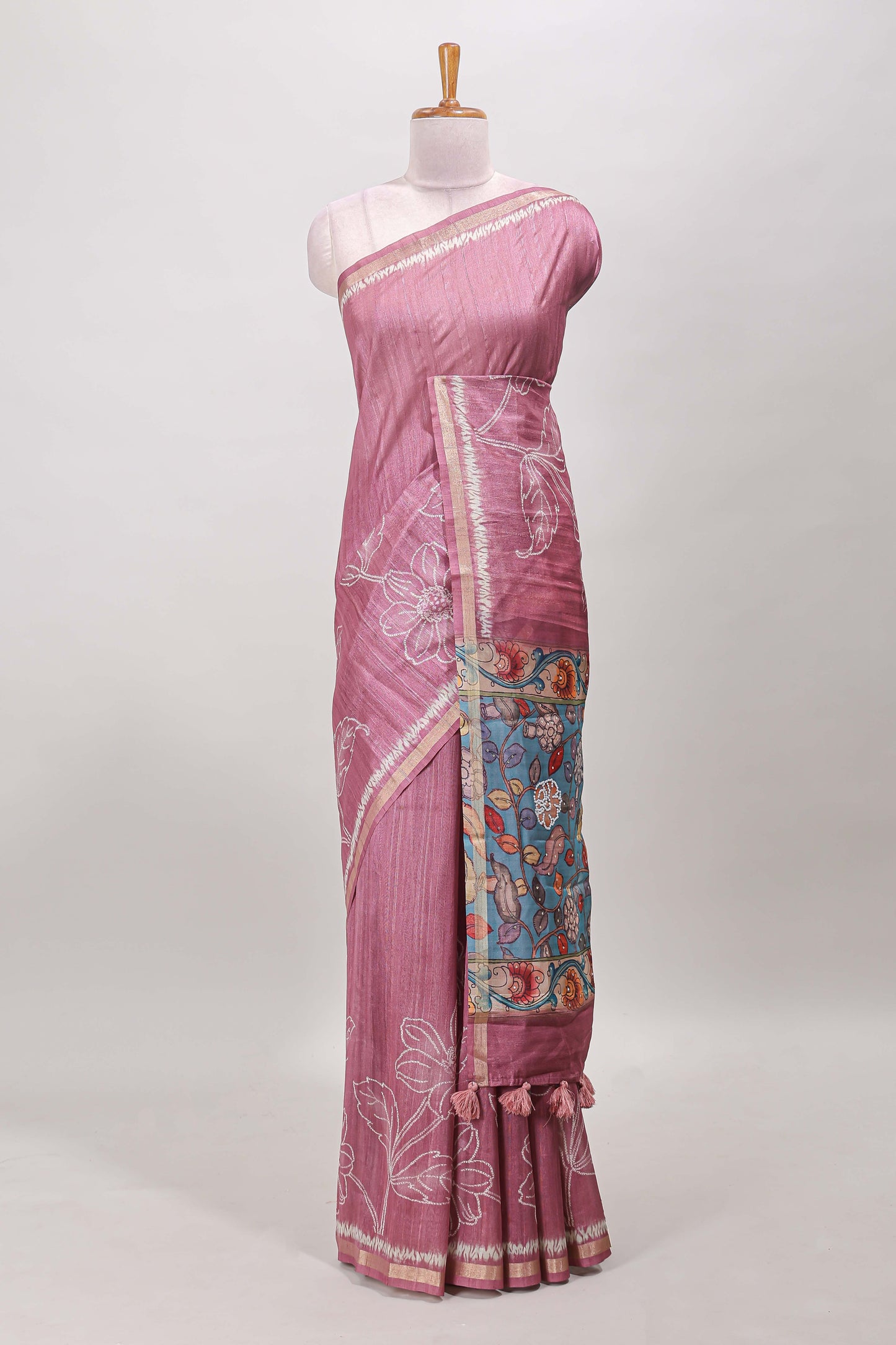 Peach floral design art tussar saree with self zari border and contrast floral print pallu