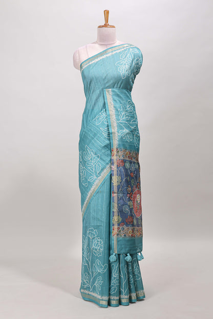 Turquoise green floral design art tussar saree with self zari border and contrast floral print pallu