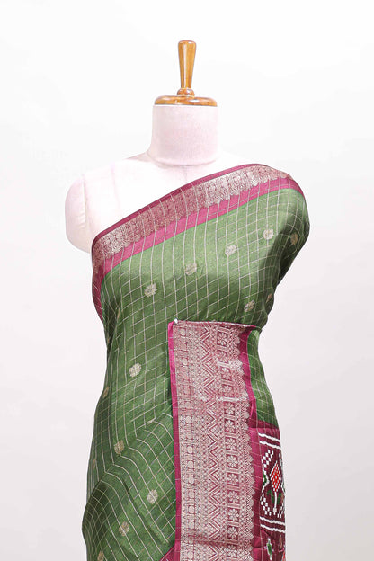 Green checked zari butta viscose dola silk saree with contrast zari border and ikkat style pallu