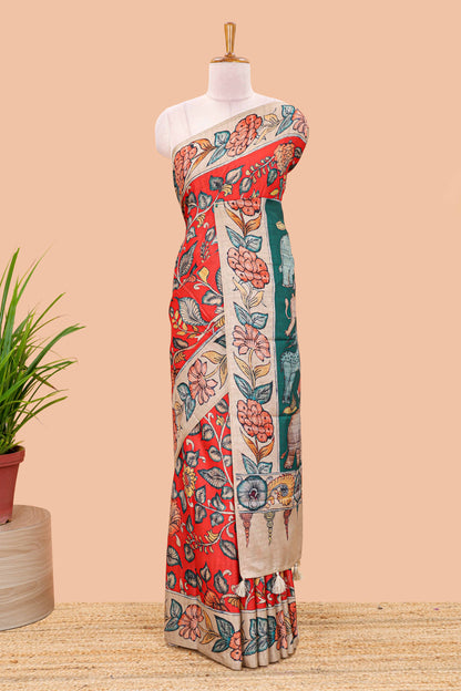 Red art tussar silk saree with leaf and floral printed body, cream border, and floral & animal print pallu