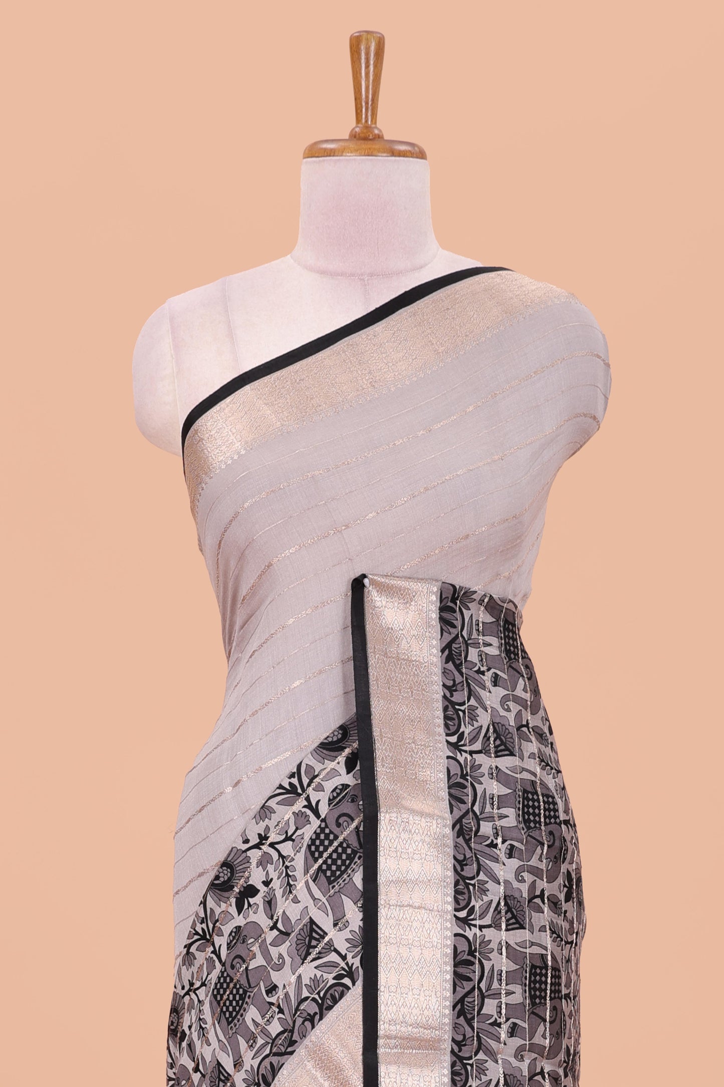 Grey striped assam silk saree with floral and animal themed contrast zari border and pallu