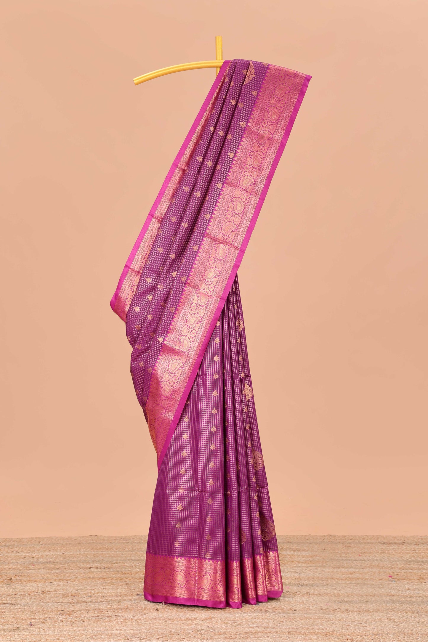 Purple checked vairaoosi semi soft silk saree with floral zari butta and contrast Pallu