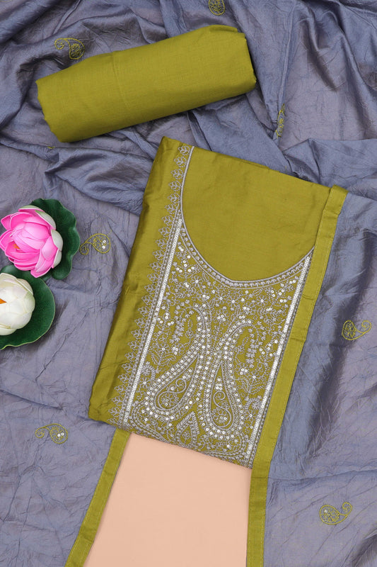 Green embroidered cotton silk chudidhar material with sequin work