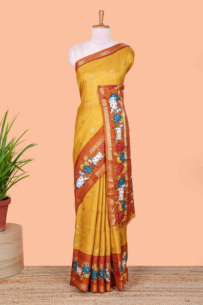 Mustard elephant zari butta art tussar silk saree with contrast pichwai cow double zari border