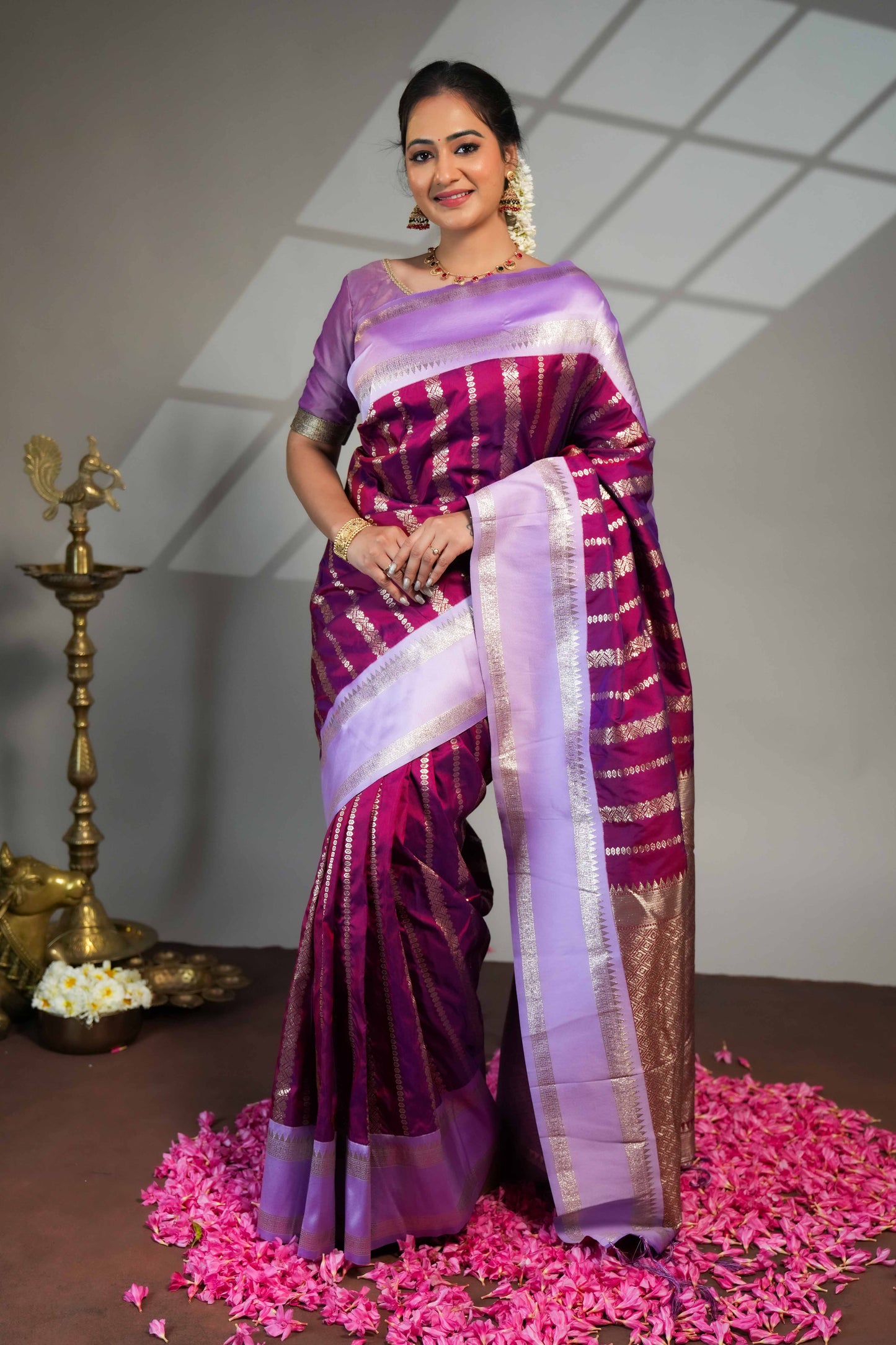 Purple zari striped floral design kathan saree with contrast bentex border and blouse