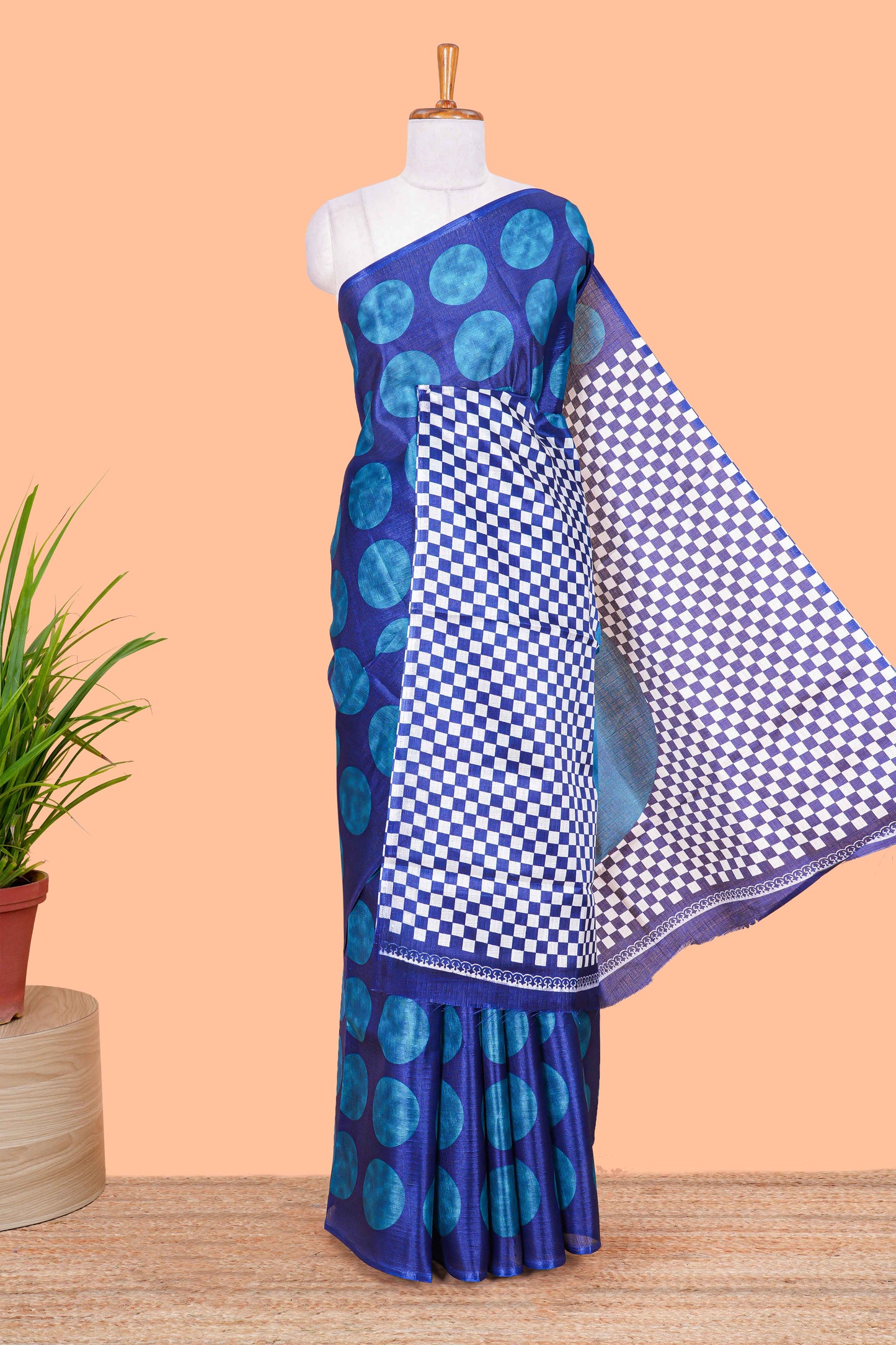 Borderless blue khadi cotton saree with adire batik print and chess board pallu