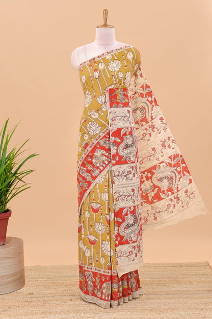 Mustard kalamkari printed cotton saree with traditional floral motifs and contrast pallu