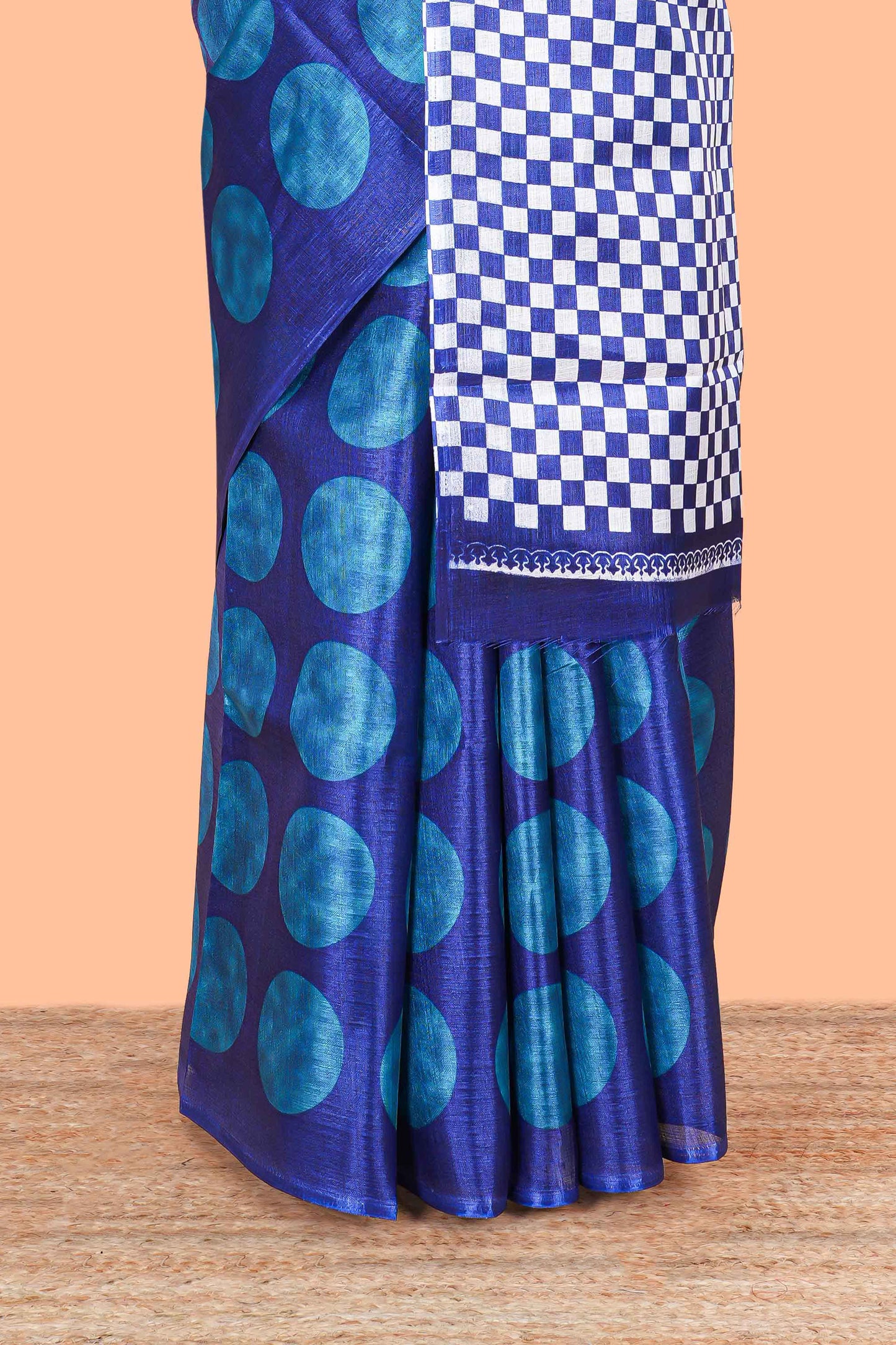 Borderless blue khadi cotton saree with adire batik print and chess board pallu