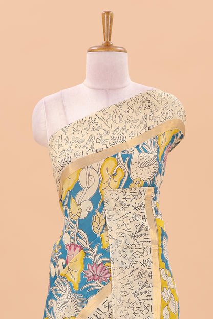 Peacock green kalamkari printed cotton saree with traditional floral motifs and contrast pallu