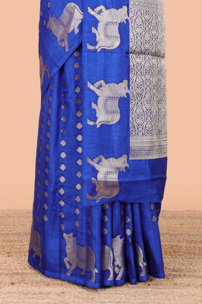 Blue viscose dola silk saree with zari butta weave, pichwai motif border and contrast blouse