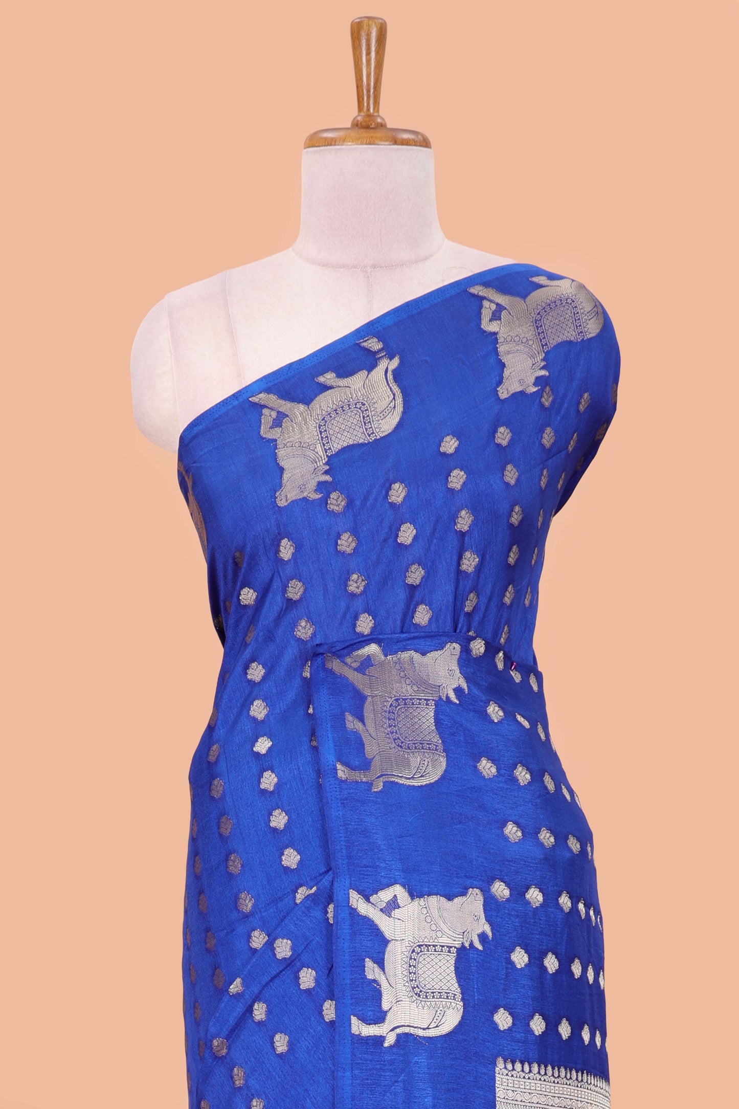 Blue viscose dola silk saree with zari butta weave, pichwai motif border and contrast blouse