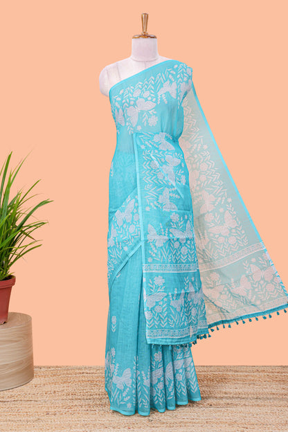 Turquoise green linen cotton saree with floral buttas and butterfly motifs border, Printed self pallu and blouse