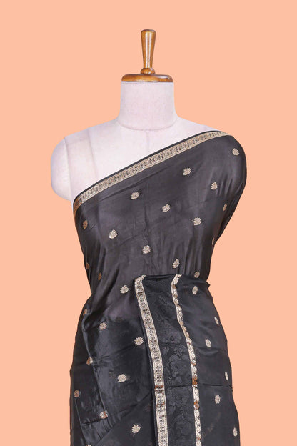 Black floral butta dola silk saree with self zari border and matching blouse