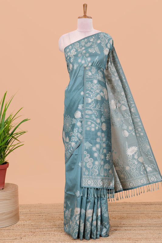 Blue munga cotton saree with all-over floral thread weaving & motif border