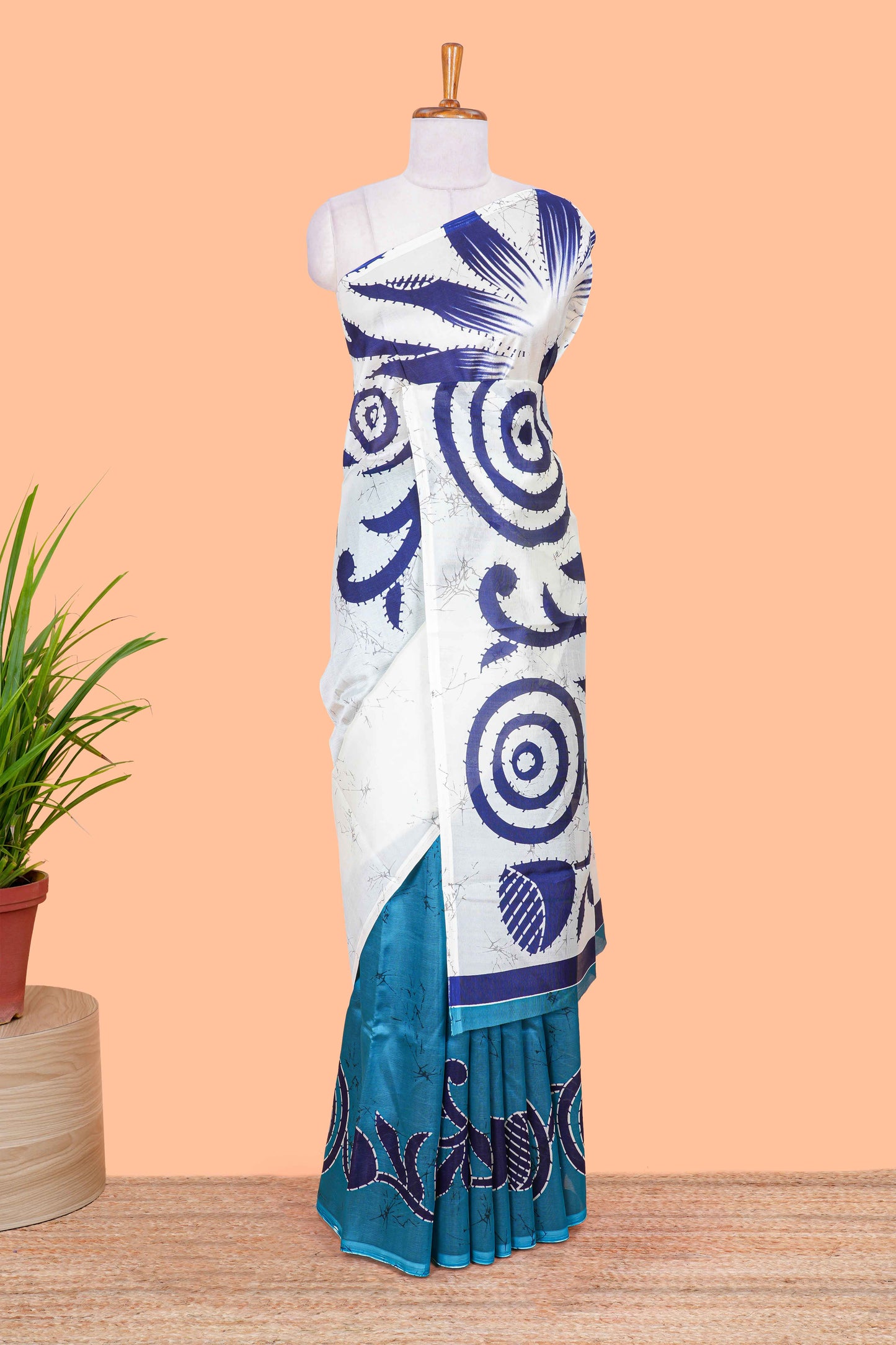 White and turquoise blue floral print litchi art silk saree with scallop print pallu