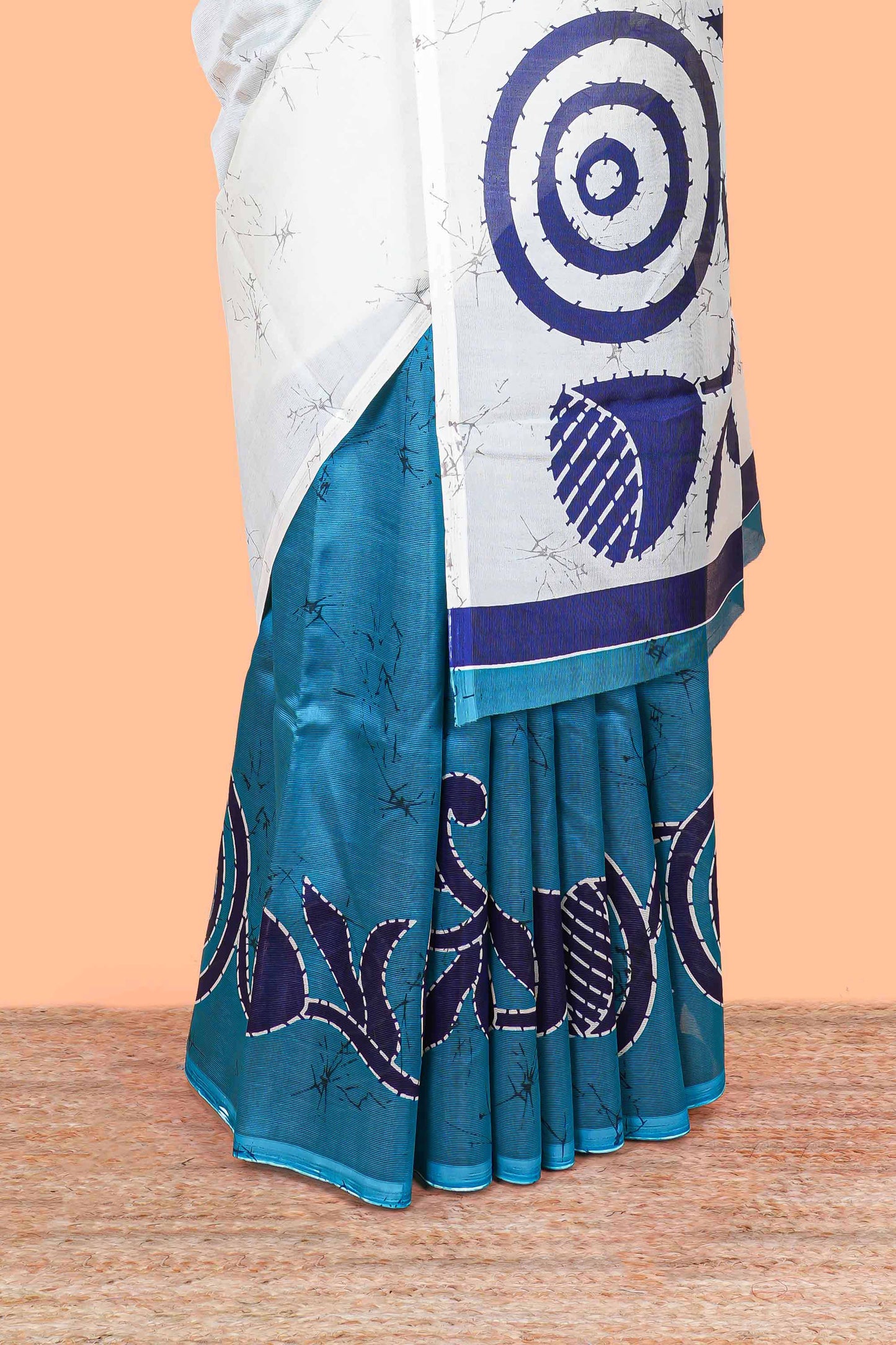 White and turquoise blue floral print litchi art silk saree with scallop print pallu