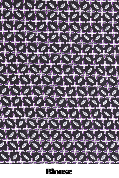 Black satin modal saree with purple polka print, contrast checked pallu, and printed blouse