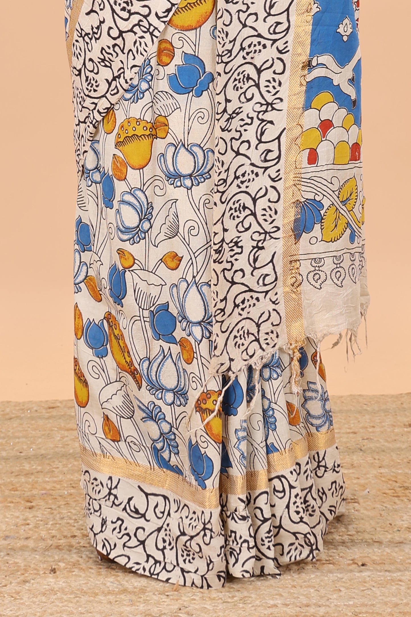 Sandal kalamkari printed cotton saree with traditional floral motifs and contrast pallu