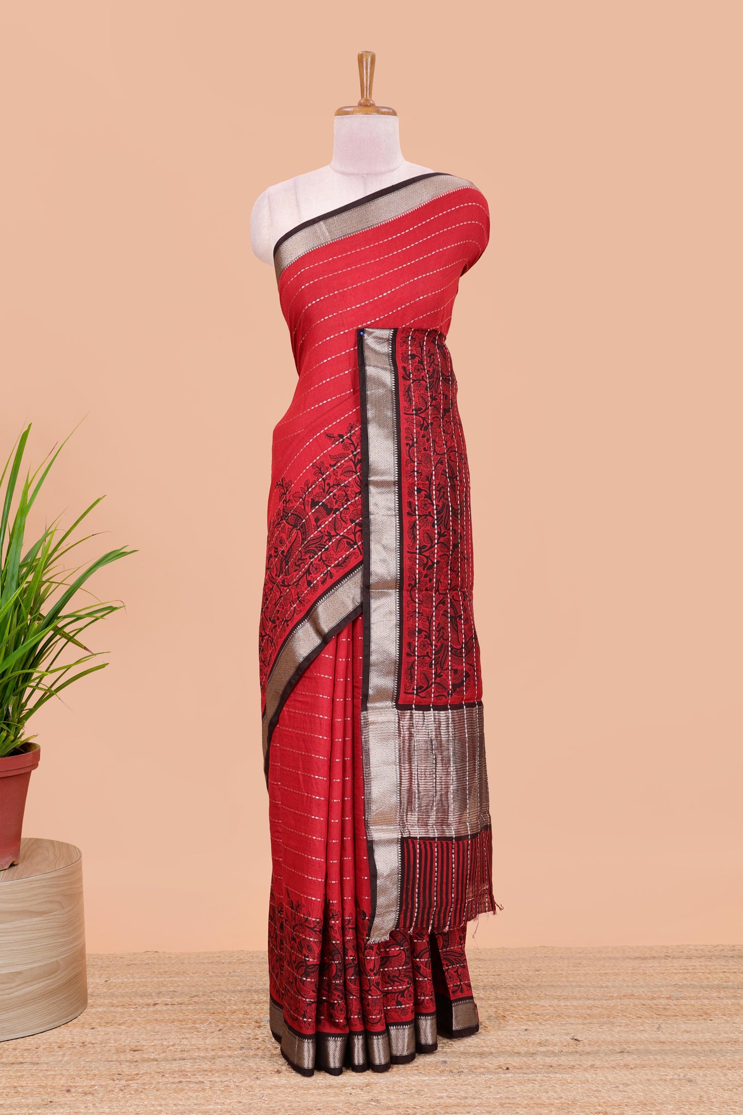 Red assam silk saree with floral printed stripes and contrast border
