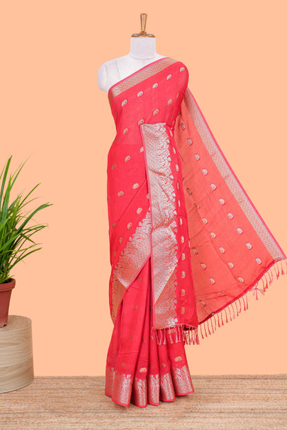 Orange marsh mallow saree with elephant butta and zari border, comes with contrast zari butta blouse