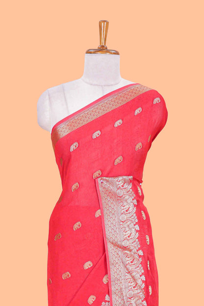 Orange marsh mallow saree with elephant butta and zari border, comes with contrast zari butta blouse