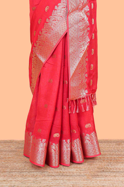 Orange marsh mallow saree with elephant butta and zari border, comes with contrast zari butta blouse