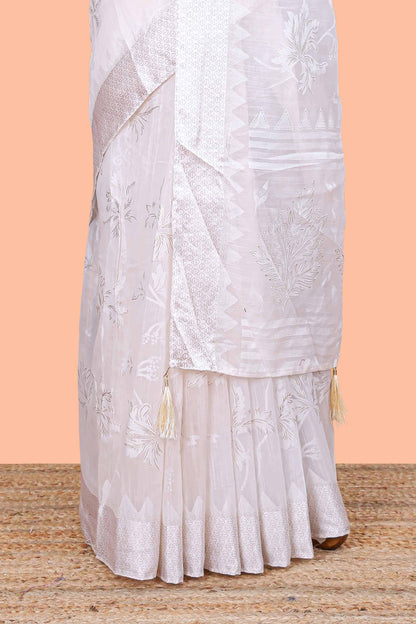 White linen cotton saree with floral foil print, self border and matching blouse