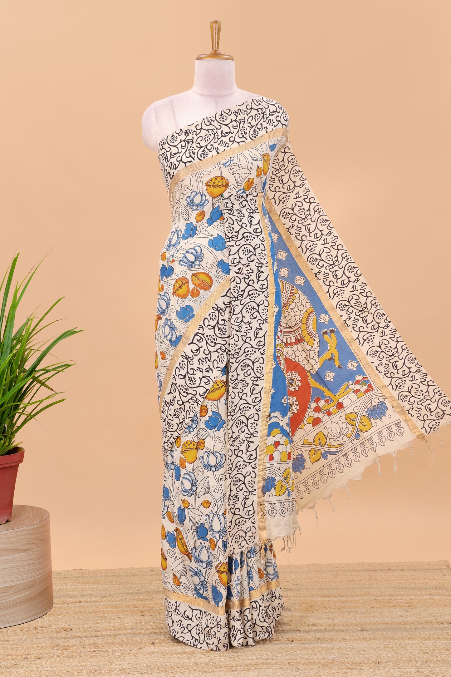 Sandal kalamkari printed cotton saree with traditional floral motifs and contrast pallu