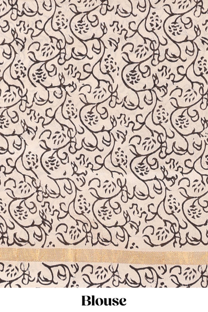 Sandal kalamkari printed cotton saree with traditional floral motifs and contrast pallu