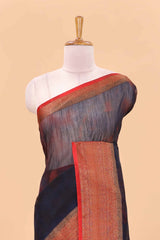 Blue jute cotton saree with contrast zari border and pallu