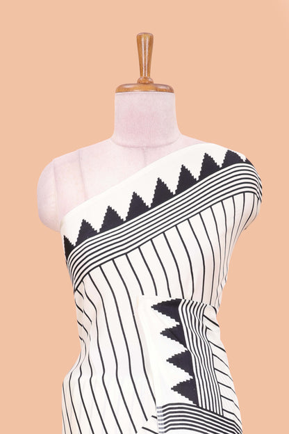 White satin ajrakh modal printed saree with striped body and geometric print border and pallu
