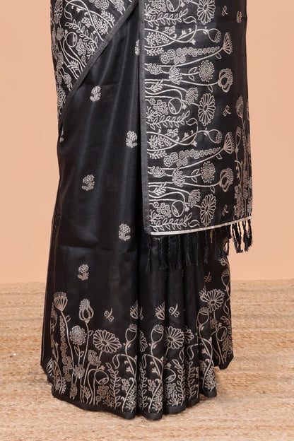 Black munga cotton saree with all-over floral thread weaving & motif border