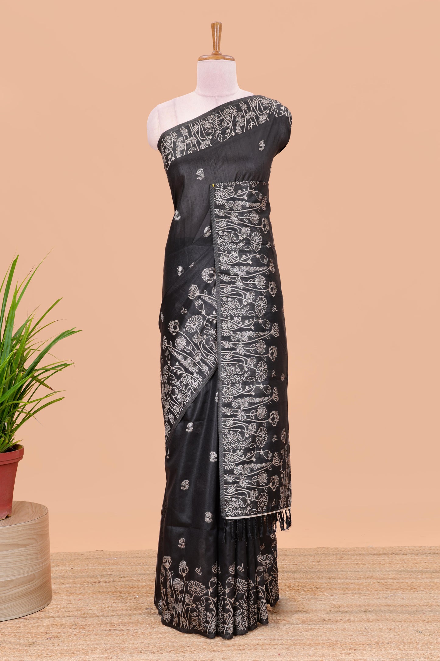 Black munga cotton saree with all-over floral thread weaving & motif border
