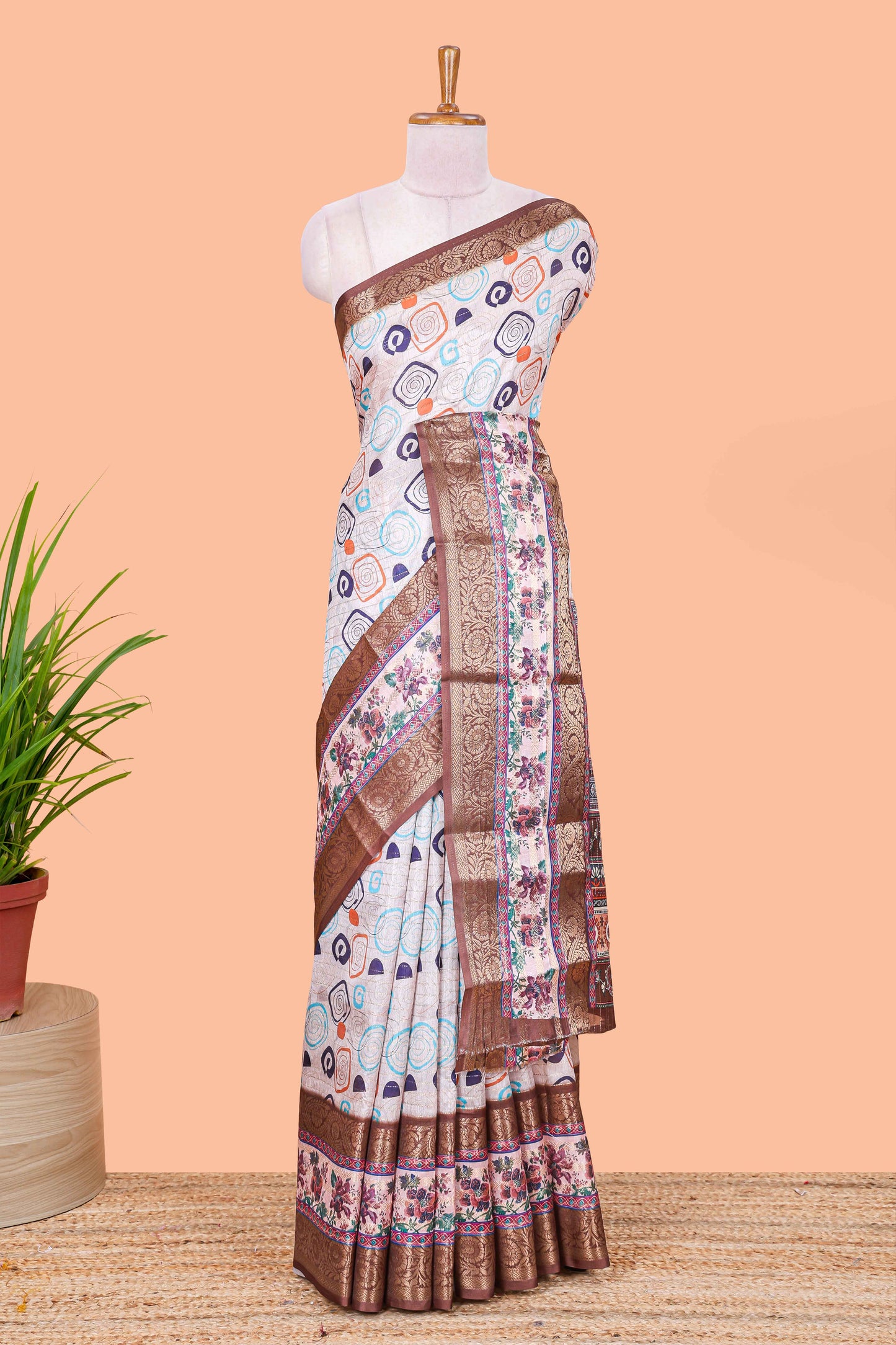 Cream zari striped geometric design art silk saree with brown retta petta border and printed pallu