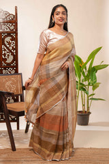 Brown Tones semi tussarall over saree Subtle Stripe and Checked pattern along with Tassels and Contrast Blouse