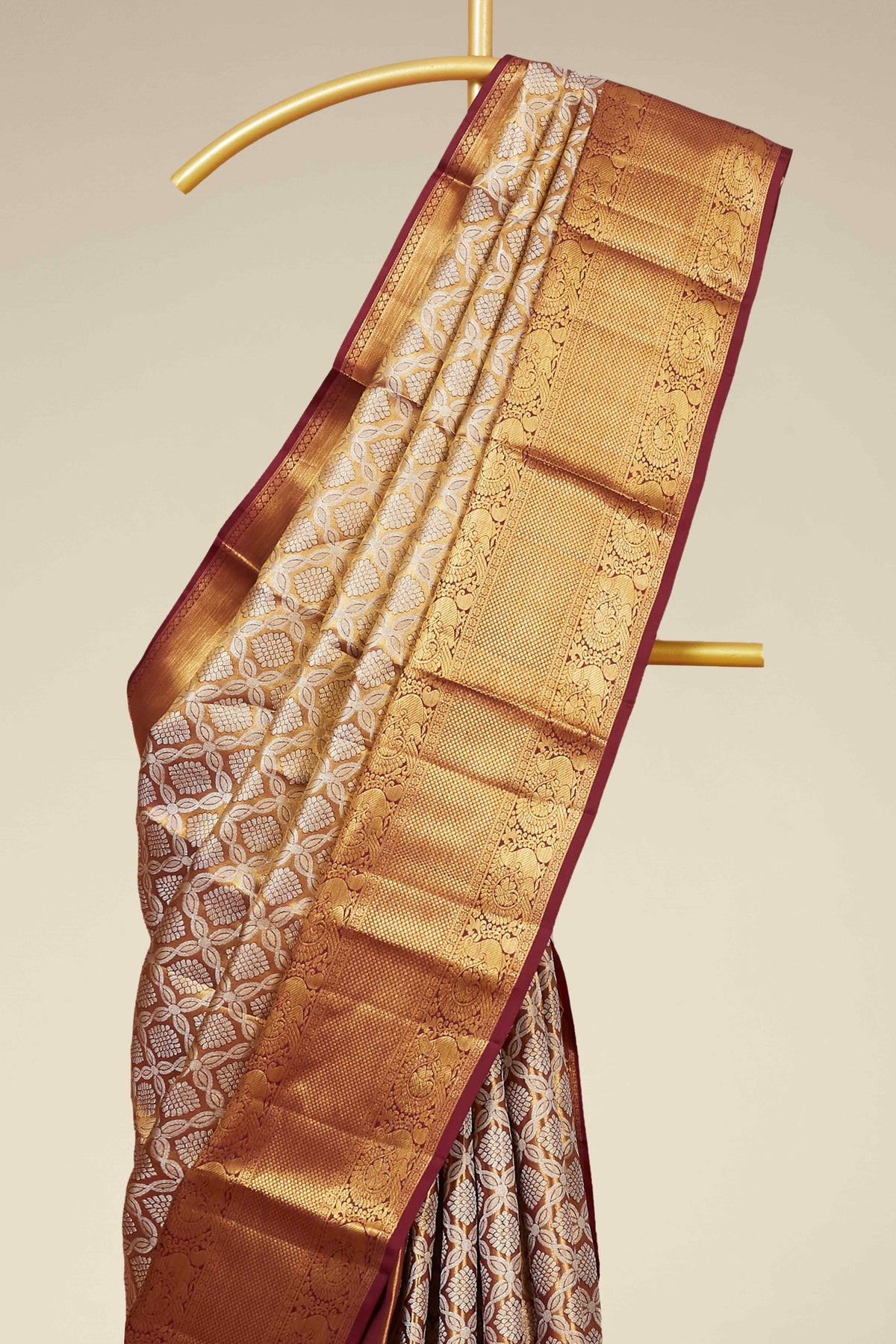 Maroon Tissue Kancheepuram Pattu With Zari Border And Elegant Pallu Design