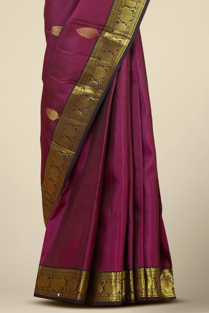 Kanchipuram Traditional Silk Saree in Deep Magenta with Gold Zari Buttas and Contrast Border