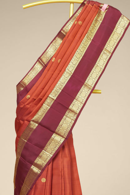 Kanchipuram Traditional Silk Saree in Rust Orange with Maroon Contrast Border and Gold Zari Detailing