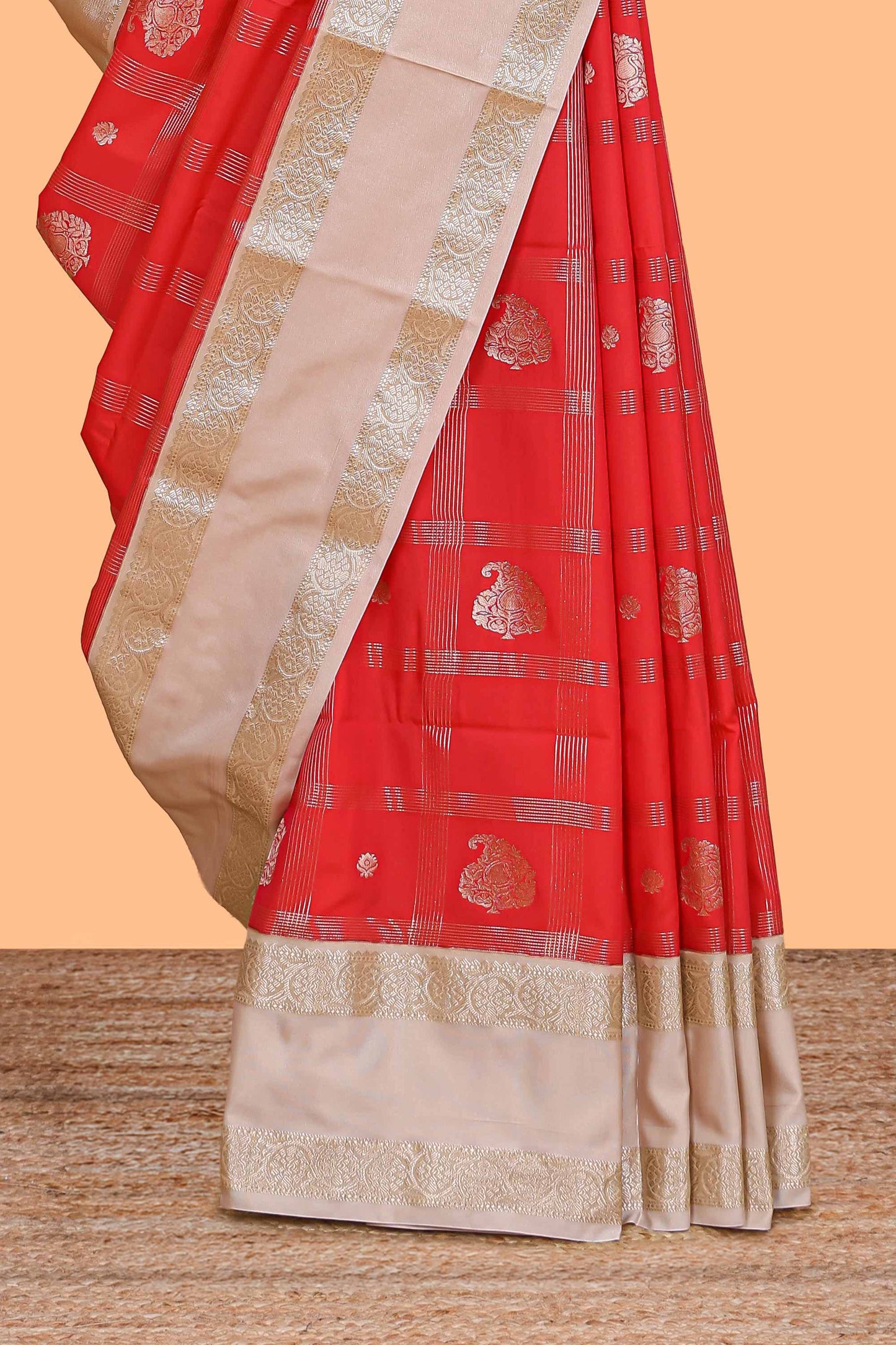 Red checked zari butta semi soft silk saree with contrast border and pallu