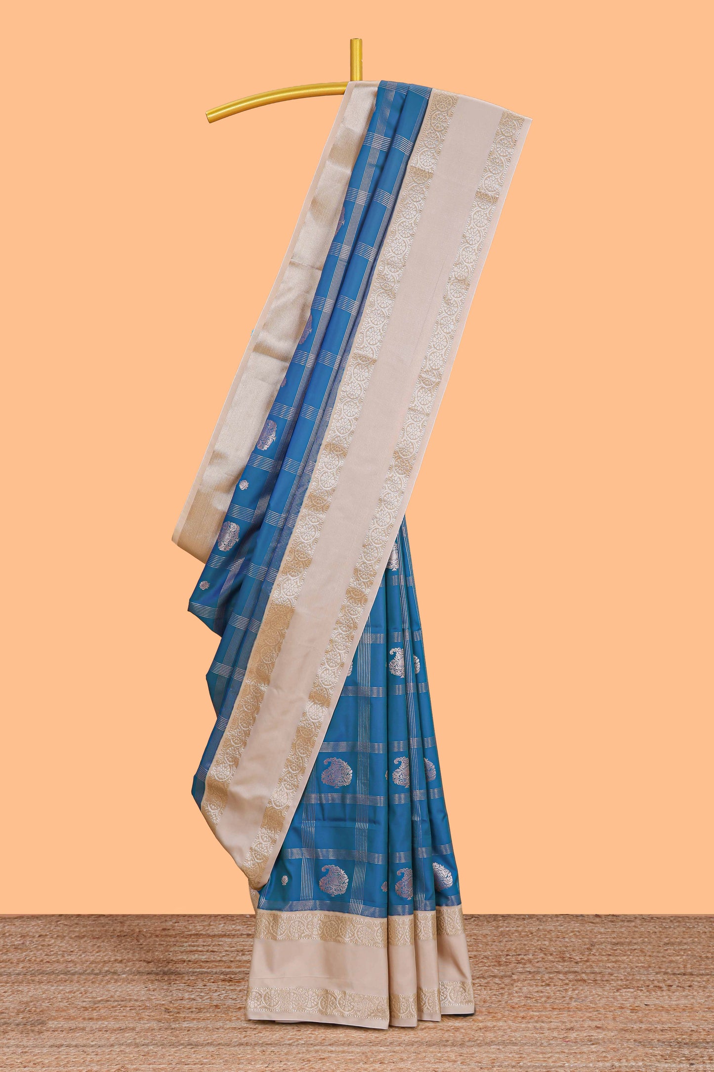 Blue checked zari butta semi soft silk saree with contrast border and pallu