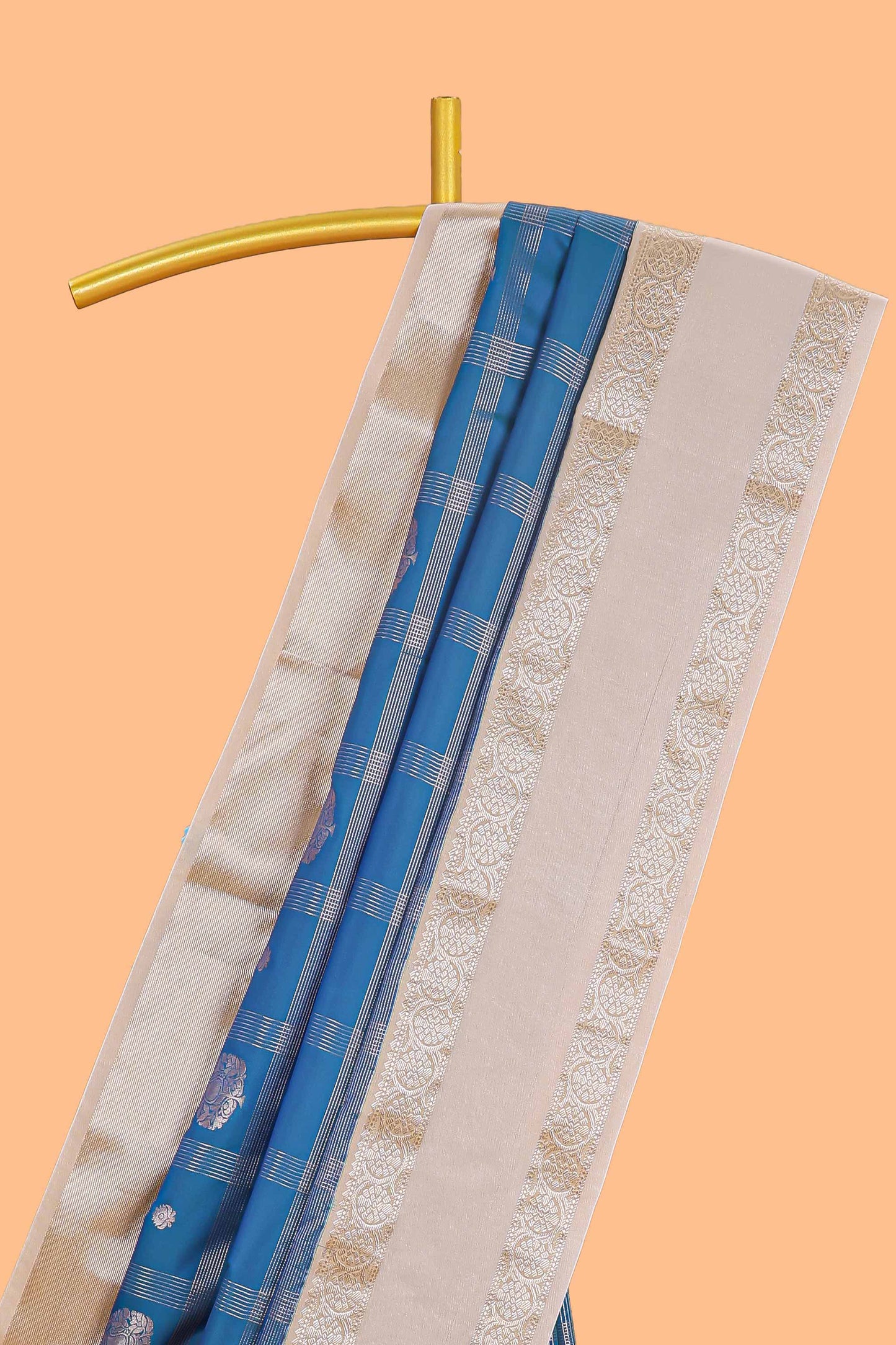 Blue checked zari butta semi soft silk saree with contrast border and pallu