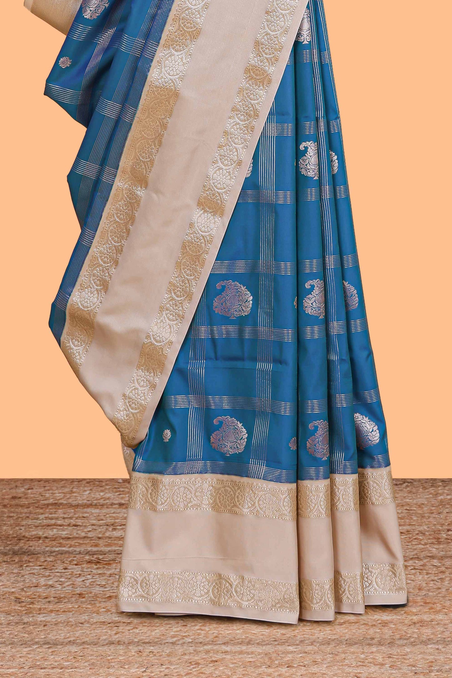 Blue checked zari butta semi soft silk saree with contrast border and pallu