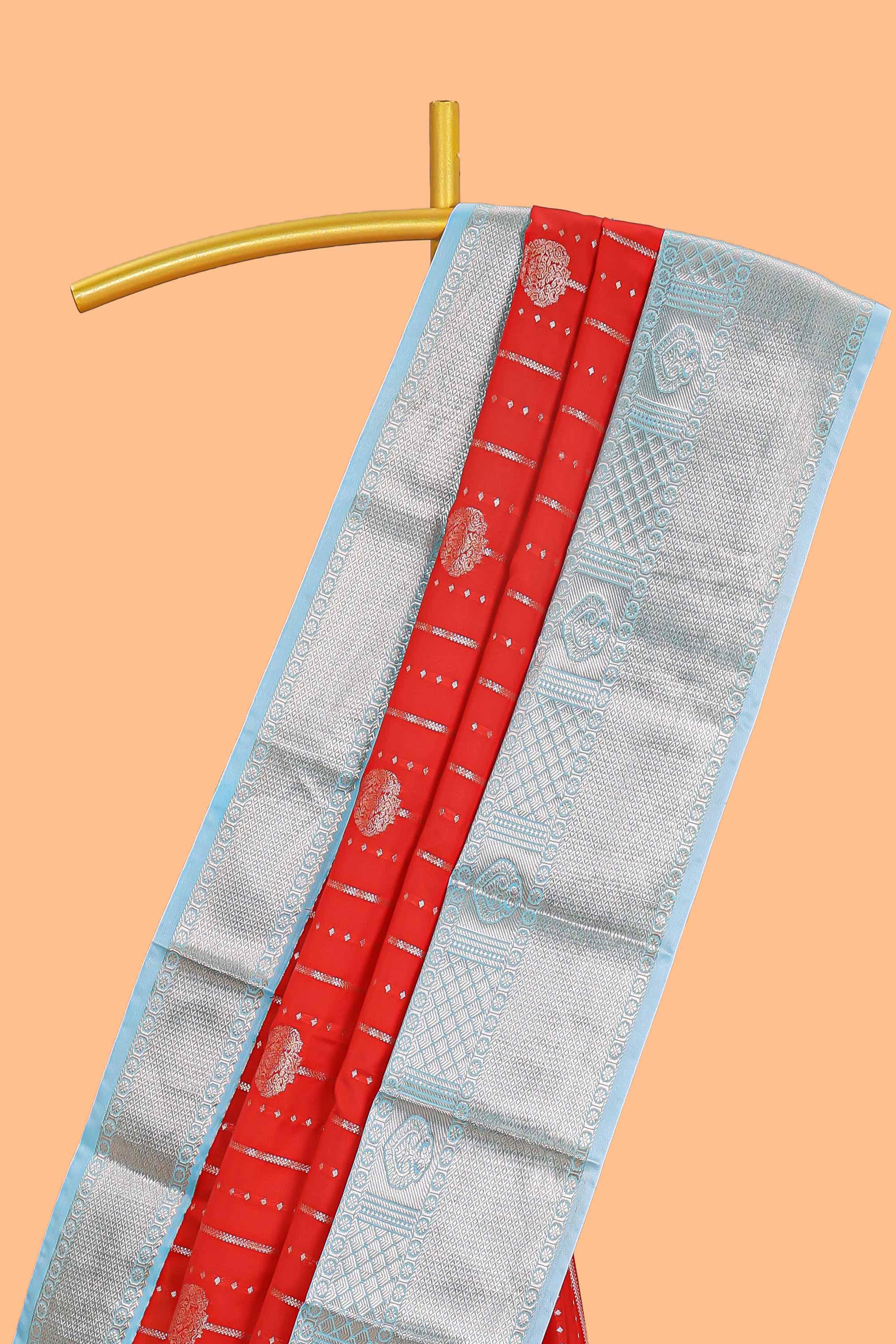 Red striped zari butta semi soft silk saree with contrast border and pallu