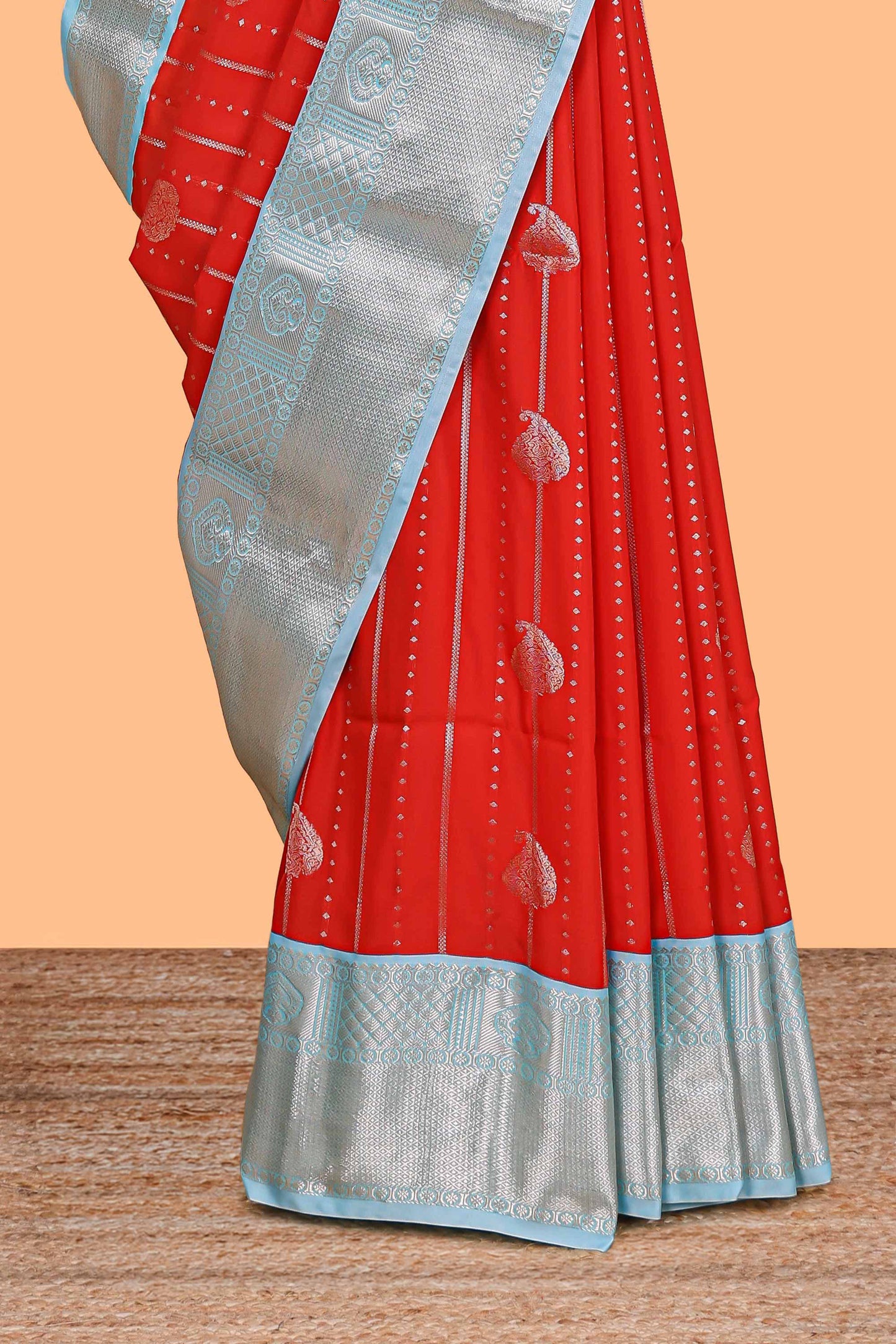 Red striped zari butta semi soft silk saree with contrast border and pallu