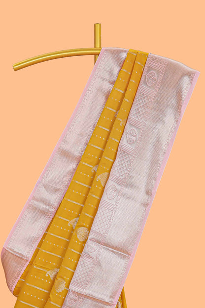 Mustard striped zari butta semi soft silk saree with contrast border and pallu