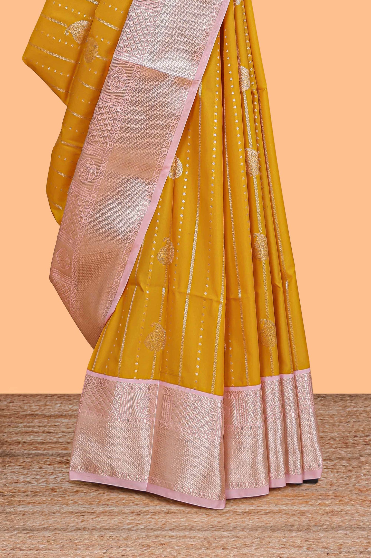 Mustard striped zari butta semi soft silk saree with contrast border and pallu