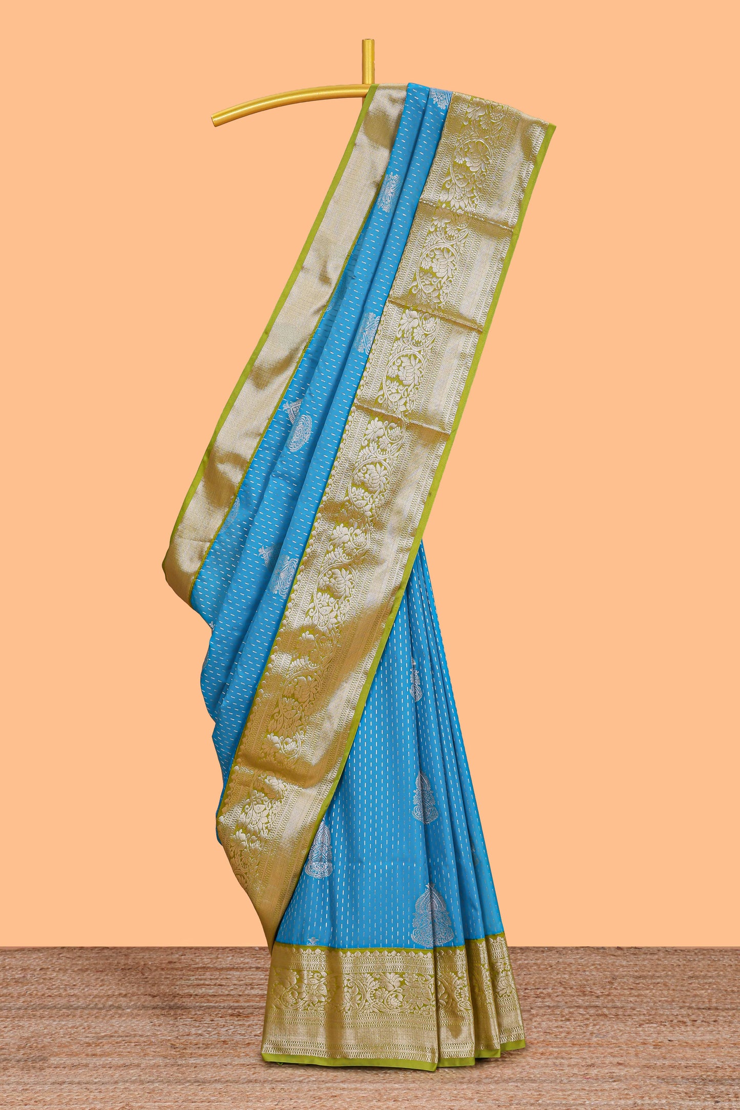 Blue zari butta design semi soft silk saree with contrast border and pallu