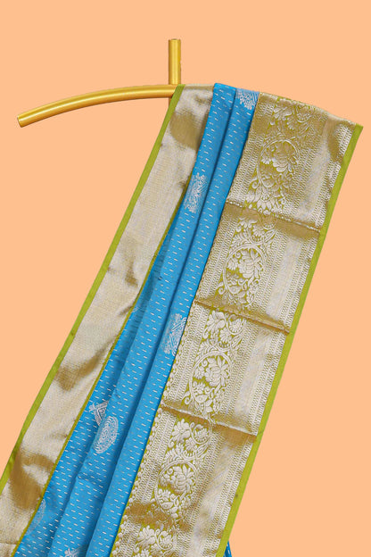 Blue zari butta design semi soft silk saree with contrast border and pallu