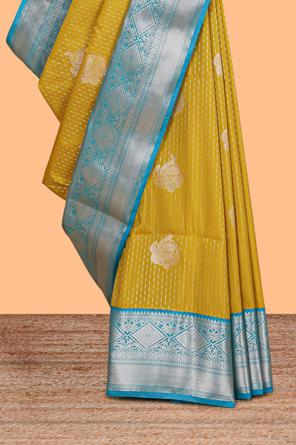 Mustard zari butta design semi soft silk saree with contrast border and pallu